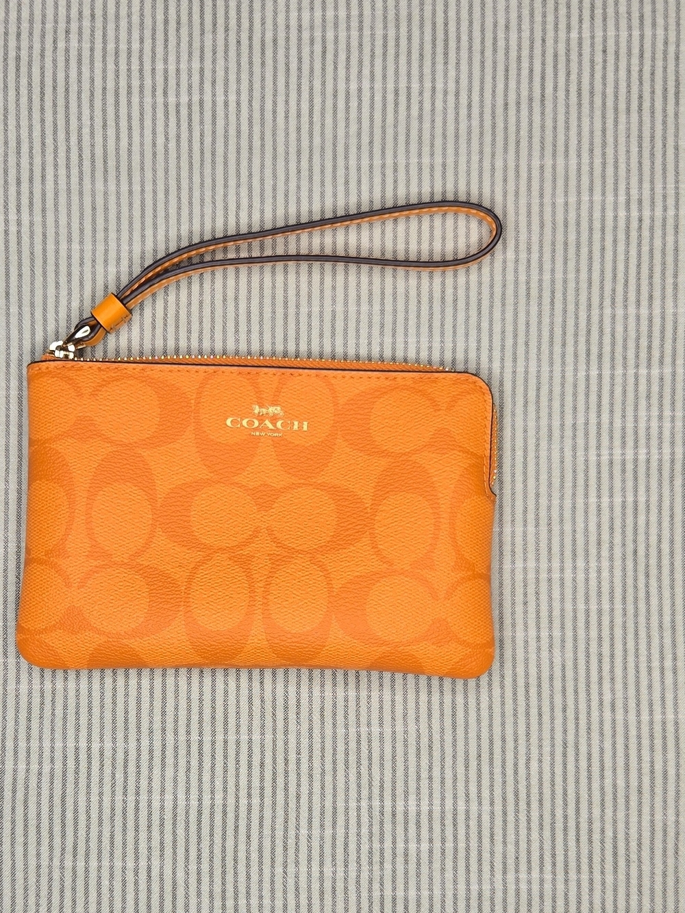 COACH Orange Signature Wristlet Clutch